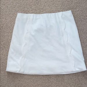 Mini white scalloped skirt